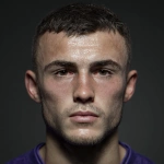 **ultra-realistic 8k portrait, belgian professional soccer player, purple jersey, short dark brown hair, clean shaven, 20 years old** - Image #1 <@689967446144188448>