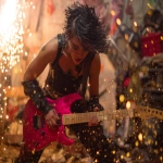 **heavy metal femmerock reptilian 80s hair bandsaw sawing through electric guitars, sparks and debris flying everywhereas the band plays down with the thickness --p djcuvnt ht8lvr3 --ar 4:3** - Image #1 <@948741381743083580>