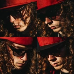 **caucasian male rapper with long brown curly hair wearing a red cap on his head tilted downward and wearing black sunglasses album cover** - Variations (Strong) by <@1097455990200340520> (fast)