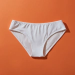 **blank white mockup of women's swimsuit brief bottom, flatlay, editorial solid color background** - Image #2 <@1071055024756637826>