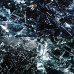 **premium sports trading card background, black ice with silver holographic foil shards, metallic chrome reflections, fractured glass textures, glowing light beams streaking through, high-energy frosty particles, futuristic collectible aesthetic, sharp and detailed, ultra high contrast, cinematic --ar 2:3 --v 6.0 --raw** - <@1007029574430892245> (fast, stealth)