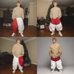 **A young handsome tan skinned white man with dirty blonde wavy short hair dressed in a Y2K Cholo gangster style, wearing a khaki long sleeve Dickies work shirt and extremely baggy, extra-long, 3XL plain long white and red Jordan basketball shorts. His shorts are very long and go down to his ankles and feet. He is wearing Nike Cortez shoes in his house by a Christmas tree --v 7.0** - Remix (Strong) by <@1061360796438900746> (fast)
-# Create, explore, and organize on [midjourney.com](<https://midjourney.com/imagine?from_discord=1>)