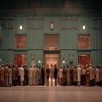 **A cinematic still, a film by Wes Anderson, a bustling british police station, wide shot, --v 7.0 --ar 16:9** - Upscaled by <@1105536971348123781> (fast)