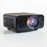 **Studio-lit isolated image of a compact portable projector with lens facing forward, textured matte casing, glowing power light, clean white background with natural shadows, sharp camera angle from slightly below lens height, --ar 4:5 --v 6.1 --quality 2 --raw** - Image #2 <@1145244586088861708>