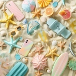 **flat lay summer scene with pastel beach accessories scattered on sand background, include sunglasses, starfish, tropical fruits, beach ball, mini surfboards, ice lollies and seashells, with stylized phone cases tucked into the layout, cute and minimalistic design, bright pastel color palette, high resolution, soft shadows and natural light, styled like a Vogue magazine editorial product shoot --ar 1:1 --v 6.0** - Image #1 <@795589902590148668>
