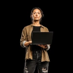 **a female software developer holding a laptop, wearing torn jeans, t shirt over long sleeve shirt, pure black background --sref <https://s.mj.run/YYNlkkGrAA0> --v 7.0** - Image #4 <@679709826716270628>