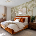 **A bedroom in a desert art deco style with burnt orange colored velvet bed, walnut and gold nightstands, subtle southwest tan rug, all white bedding, olive green art deco palms wallpaper, and mirros with gold pendants over nighstands.** - Image #4 <@1144662796194287688>