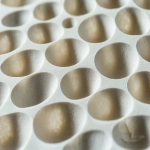 **Close-up of ceramic honeycomb catalyst substrate used in bioenergy emission control, shown in angled side view, perfect lighting on textured grid pattern, isolated studio scene, hyper-realistic and clean --ar 3:2 --v 6.1 --quality 2 --raw** - Upscaled (Creative) by <@1145244586088861708> (relaxed)