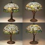 **dogwood tree early morning light spring time in the style of John Singer Sargent painting as a stained glass lamp on a bronze base --v 6.1** - Variations (Strong) by <@1046828015524519936> (fast)