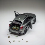 **A studio photograph of a plastic toy BMW X3 M Competition in ash grey, miniature scale, unmistakably a toy car. Extremely exaggerated toy plastic texture, thick glossy injection-molded plastic, visible mold lines, seams, and joints, slightly matte-to-glossy synthetic finish, tactile toy-like surface. Simplified details, rounded edges, chunky proportions, playful scale model aesthetics. The car is perfectly centered in the frame and appears small within the composition, with lots of clean negative space around it. Rear left three-quarter view. The trunk is open, revealing two transparent plastic toy bags filled with stylized cannabis buds made of plastic, clearly fake and toy-like. The front left door (driver side) is slightly open, and bundles of toy money bills made of plastic are falling out onto the white surface, frozen mid-fall. Collectible toy, miniature diorama, clearly not real. Seamless white background, high-key studio lighting, soft diffused shadow directly underneath the car, toy product photography style, macro lens look, shallow depth of field, ultra-detailed plastic textures, playful realism, no people, no text --ar 1:1 --v 6.0 --raw** - Image #1 <@374329521580802048>