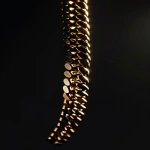 **hyperrealistic photo of a luxurious gold chain hanging in complete darkness, sharp shadows, front view, highly detailed metallic texture, dramatic lighting contrast, minimalist composition, pure black background, --v 6.0 --ar 9:16 --stylize 10 --raw** - Image #4 <@1143462810593013840>