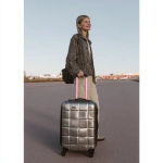 **<https://s.mj.run/2J3G2E0ob70> Geomagnetic storm. A 18-year-old female model, dressed fashionably, with a smile on her face, behaving gracefully, her hair neatly combed, carrying a suitcase in her hand, is outside the airport.** - Image #4 <@1348821992492630036>