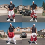 **A young handsome 30 year old very muscular buff white man with a white durag on his head dressed in a Y2K Cholo gangster style, wearing a black Pro Club t shirt and extremely baggy, extra-long, 3XL plain red and white Jordan basketball Y2K shorts. He is wearing Nike Air Force 1s standing in his driveway. --v 7.0** - Remix (Strong) by <@1061360796438900746> (fast)