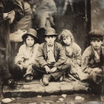 **poor children from the time of Charles Dickens, wearing worn and tattered clothing, begging on the street, tintyype photo** - Image #1 <@1135636698060038216>