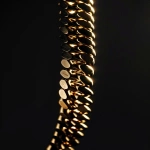 **hyperrealistic photo of a luxurious gold chain hanging in complete darkness, sharp shadows, front view, highly detailed metallic texture, dramatic lighting contrast, minimalist composition, pure black background, --v 6.0 --ar 9:16 --stylize 10 --raw** - Image #1 <@1143462810593013840>