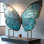 **on display 1 Art suprematism and abstraction movement art design, a surrealist art style base that contains a natural crystal point a watchful Zdzisław Beksiński style butterfly sculpture. With a gold small skull creature that is included in the body of the creature that has direct lighting and an angled side view. The wings have a natural look in coloured acrylics with turquoise and flat brass. Cultural and creative product design, high-end, high-quality. --c 5 --s 700 --w 450 --v 6.1 --ar 4:5 --q 2** - Image #3 <@923747341717078036>