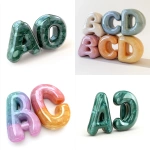 **Cute "ABCD" in aventurine, pure white background, realistic use of light and color, soft gradient, soft lighting, high resolution in the style of honeycore. --ar 107:122 --style raw --stylize 250 --v 6.1** - <@1010963827053043793> (relaxed)