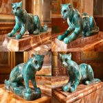 **A cat made out of aventurine on top of a polished table --chaos 25 --ar 3:2 --stylize 250 --weird 200 --v 6.1** - Variations (Strong) by <@1029767017399595109> (fast)