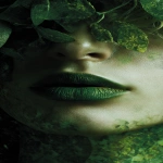 **Abstract close-up portrait of a face, surreal features, lips painted in vibrant green lipstick, hair flowing upward made entirely of lush green leaves, organic textures blending into skin, ethereal botanical patterns, dreamy surrealist composition, glowing highlights, soft shadows, artistic fashion editorial vibe. --ar 9:16** - Image #2 <@1137663032605028362>