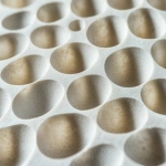 **Close-up of ceramic honeycomb catalyst substrate used in bioenergy emission control, shown in angled side view, perfect lighting on textured grid pattern, isolated studio scene, hyper-realistic and clean --ar 3:2 --v 6.1 --quality 2 --raw** - Image #3 <@1145244586088861708>