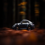 **a Porsche 911 Targa netsuke exaggerated forced perspective with motion blur --ar 295:166 --style raw --s 250 --iw 2.5 --c 25 --q 2 --p x1ml6ks 7t7o6mb** - Image #2 <@1059634795207991457>