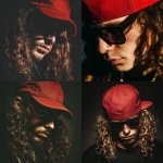 **caucasian male rapper with long brown curly hair wearing a red cap on his head tilted downward and wearing black sunglasses album cover** - <@1097455990200340520> (fast)
