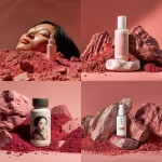 **a bottle of white skin care product with an asian woman in the style of rembrandt behind it, surrounded by pink rock powder and red sand in the background. the minimalist style features soft lighting, a clean composition, frontal perspective, pure color tones, delicate texture, natural elements, soft light, and exquisite details. - - C50** - <@1096007582616928276> (relaxed)