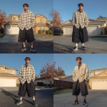 **A young handsome tan skinned white man with light brown hair cut short in a wavy shaggy hairstyle dressed in a Y2K Cholo gangster style, wearing a long sleeve flannel button up tan and white work shirt and extremely baggy, extra-long, 3XL plain long black white and blue Jordan basketball shorts. His shorts are very long and go down to his ankles and feet. He is wearing Nike Cortez shoes standing in his house in the winter --v 7.0** - Variations (Strong) by <@1061360796438900746> (fast)