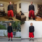 **A young handsome tan skinned white man with dirty blonde wavy short hair dressed in a Y2K Cholo gangster style, wearing a black long sleeve Dickies work shirt and extremely baggy, extra-long, 3XL plain long red and black Nike basketball shorts. His shorts are very long and go down to his ankles and feet. He is wearing Nike Cortez shoes in his house by a Christmas tree** - <@1061360796438900746> (fast)