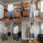 **A young handsome tan skinned white man with light brown hair cut short in a wavy shaggy hairstyle dressed in a Y2K Cholo gangster style, wearing a long sleeve flannel button up white and tan work shirt and extremely baggy, extra-long, 3XL plain long white and blue Jordan basketball shorts. His shorts are very long and go down to his ankles and feet. He is wearing Nike Cortez shoes standing in his house in the winter** - <@1061360796438900746> (fast)