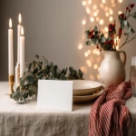 **<https://s.mj.run/ZGmARJ5k5Y8> A white mockup card on a minimalist and elegant festive christmas table, warm light, fairy light bokeh, linen tablecloth, elegant and natural holiday aesthetic. Red, deep green, beige color palette. Elegant Christmas --ar 4:3 --v 7.0** - Image #2 <@1038768977310121984>