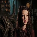 **<https://s.mj.run/8pQtVNsIJ6E> starlett Lauren Bessie giving an interview in a tenebrous movieset --ar 7:5 --v 7.0 --raw** - Image #3 <@1071135204846096475>