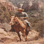 **1970s photograph marlboro man cowboy on a horse riding through rugged terrain 8K detail 12000x1600 pixel resolution printed on A 3x4 foot advertising hoarding --ar 9:16** - Image #1 <@1321783096353357878>
