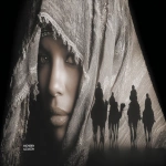**a poster with "Michael Delmar images" lonely wife, Shadows in a dark room at midnight, Enki Bilal art B&W tykho moon woman with fishermen on a boat on the sea sheep, beautiful yoga sand dunes, saguaro cacti, beats antique, androgynes DNA strand, perfectly beautiful people, full bodies walking through a desert sand dunes following bedouins, Enki BIlal illustrated STyle Double exposure, extreme details, rich dynamic colors, spirit, invocation, 3d, two sun solar system, full moon, stars, esoteric, sheer, Peridot, emerald green. citrine, ultramarine blue, diamonds, gold, sunset, high contrast, painting classic, oil , diodes, bows, velvet vogue, iridescent, holographic, full body pose, transparent details, colorized, neon pastel color palette, photorealistic, highly detailed, transparent parts, looks like professional hdr photography in fashion magazine, editorial photography, global illumination, moody lighting, post-processing, glowing shadows, chromatic aberration, black and white balance, scattering, beautiful cinematic lighting, lumen reflections, post-production, high fashion, tone mapping, shaders, diffraction grading 3d, octane render, detailed, hyperrealistic, 8k, --chaos 92 --ar 8:5 --stylize 750 --v 7.0** - Image #1 <@843177938186797076>