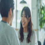 **Beautiful Japanese woman and handsome Japanese man smiling and talking together in a bright modern office, teamwork and friendly atmosphere, natural light, clean desk environment, cinematic lighting, professional recruitment photography, cheerful workplace vibe --ar 16:9 --v 6.0 --raw** - Image #3 <@1074578484602601522>