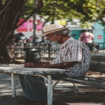 **an old Cuban man playing Domino on a park bench in Miami Florida, Miami vibes, Cuban vibes, phone wallpaper dominoes, --ar 9:16** - Image #3 <@546809539174072320>