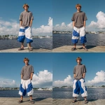 **A young handsome tan skinned white man with light brown hair cut short in a wavy shaggy hairstyle dressed in a Y2K Cholo gangster style, wearing a Shaka grey t shirt and extremely baggy, extra-long, 3XL plain white and blue Jordan basketball shorts. He is wearing flip flops standing on a dock in Jacksonville Florida. His shorts go down to his feet touching the ground and his shoes --v 7.0** - Variations (Strong) by <@1061360796438900746> (fast)
-# Create, explore, and organize on [midjourney.com](<https://midjourney.com/imagine?from_discord=1>)