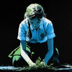 **simple painting of a school girl on her knees gardening, facing forward front-on, school logo clearly visiable on front of shirt, black background, backlit blue and green --v 7.0** - Image #2 <@696956474584334417>