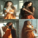 **a long-haired asian girl is brushing her very thick and voluminous straight hair in the bathroom, wearing an orange dress, and has an extremely realistic video texture. the background of high-definition photos features light gray tiles and glass windows, with sunlight shining on them from outside. she also uses a blue wooden brush to style her luxurious hair, creating a warm atmosphere. --ar 9:16** - <@1176528279734329450> (fast)