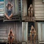 **Amazon. a sweltering rainy day. A colour photo, of a Latin American woman resembling Salma Hayek 32, scruffy, straight black hair, no makeup, sitting cross legged on the steps of a wooden shack , wearing a plain fitted v neck singlet , tight shorts, sandals, hands pushing her hair back, looking up, smiling --ar 16:9 --s 50 --v 7.0** - <@1047237047888379954> (fast)