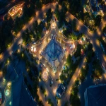 **a big game arcade centre pavillion in a theme park at night with little roads surrounded. The overall park shape is a triangle wider at the bottom, drone perspective, there are two roads around that converge to the one point plaza at the end on the top --ar 16:9** - Image #3 <@900813711206391889>