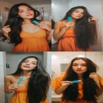 **a beautiful young woman with long, dark hair is using a blue comb to brush her thick, voluminous, and straight hair in the bathroom. she is wearing an orange dress and has no makeup on her face, her skin appearing natural with a few blemishes. her hands are holding a soft green toothbrush, and her eyes are open, looking at the camera. from the back, her hair is so long that it touches the ceiling of the small washroom. --ar 9:16** - <@1176528279734329450> (fast)