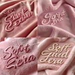 **a luxurious all-typography logo that reads "Soft Girl Era", featuring elegant cursive script that is soft, feminine, and girly, embossed into a smooth blush-pink suede background, the letters themselves have a plush suede texture with subtle highlights and shadows, softly lit with natural diffused lighting, ultra-realistic fabric detail, shallow depth of field, high resolution, minimalistic composition, no extra icons or symbols, focus entirely on the typographic suede logo on the suede backdrop --ar 1:1 --v 6.0 --s 250 --raw** - <@1070056867990085722> (fast)