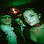 **<https://s.mj.run/iOochzqrgsM> <https://s.mj.run/wS8RZ66Avuw> Digital photograph, young women and men at a strange party, green tones, blue tones, wood grain, Bals des Victimes, Reign of Terror, post revolution, Directory period, Paris 1796, Guillotined Relatives, Digital photograph, Red Ribbon/String Choker, green tones, blue tones, wood grain, Coiffure à la Titus, Mourning Clothes, Decadence & Hedonism, Macabre Salutation, Royalist/Political Gatherings. --iw 0.2 --ar 4:5 --chaos 18 --v 7.0** - Image #1 <@988364629556199494>