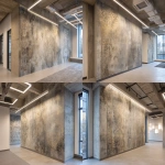 **A photo of an intricate, hand-painted wallpaper with faded gold and silver designs on the wall in an office building. The texture is rough concrete with visible sanded edges. There's an LED light bar above it that casts a soft glow over its surface. A windowless corner wall is on one side. In the background, there's another wallpaper design that looks similar but less detailed. It has more colors and patterns. The room also features white square lighting fixtures on the walls, creating subtle shadows on the ceiling. --ar 32:23** - Variations (Strong) by <@1313000520759377972> (fast)