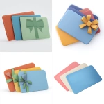 **Semi-3D soft 3D illustration Three gift cards / certificates lying in a fan arrangement. Each card has a solid background color. Smooth rounded corners, subtle depth, friendly and trustworthy style. Minimalistic composition, clean white background. High quality, no noise, no gradients outside the cards. --v 7.0 --s 50 --raw** - <@1067019184246112329> (fast)