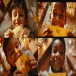 **[URL de ton image de référence ici] Cinematic film still, photorealistic. Low-angle close-up shot of the same boy from the reference image, filmed in counter-plongée from below. He is holding a small yellow post-it note in his hands and reading it. His face glows with joy and tenderness: eyes glistening with emotion, a faint tear in the corner of his eye, but above all a wide radiant smile of pure happiness. His expression clearly conveys the beautiful surprise of just learning he is going to be a big brother. The atmosphere feels heartwarming and cinematic, like a touching scene from a Christmas film. Warm golden light softly illuminates his face, shallow depth of field keeps the focus on his joyful expression. The background is blurred with soft hints of wrapping paper and a baby mobile box. Subtle film grain, natural skin tones, realistic detail, gentle cinematic look. Shot like a high-end Christmas commercial with an Arri Alexa cinema camera --ar 16:9 --v 6.0 --no cartoon, cgi, heavy tears, scary look --raw** - <@1072446343324385341> (fast, stealth)