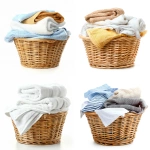 **folded dry loundry in a basket. white background --v 6.0 --style raw** - <@1060466770776961064> (fast)