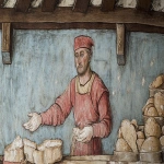 **Medieval illuminated manuscript scene depicting weary man in medieval clothes standing inside a bakery with flour on his face and hands; rough wooden beams above, flat perspective, rich saturated colors, delicate black outlines, 14th century European manuscript style, parchment texture, simplified stylized figures with pale complexions and rosy cheeks, architectural background with blue-gray walls, minimal shading, historical accuracy, --ar 16:9 --v 6.1 --raw** - Image #1 <@1168965155363762248>
