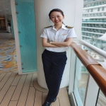 **iPhone photo of a woman in a cruise ship crew uniform, 25 years old, beautiful, full-length --ar 3:4 --s 50 --raw --v 7.0** - Image #4 <@1264344222698307735>